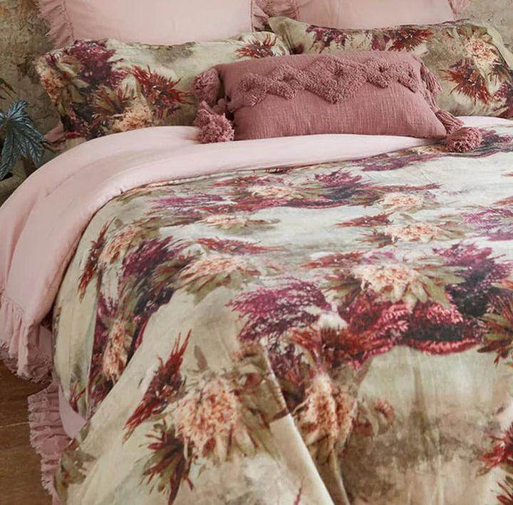 Floral printed comforter set with ruffled blush pillows