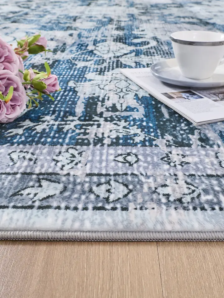 Blue distressed rug close-up