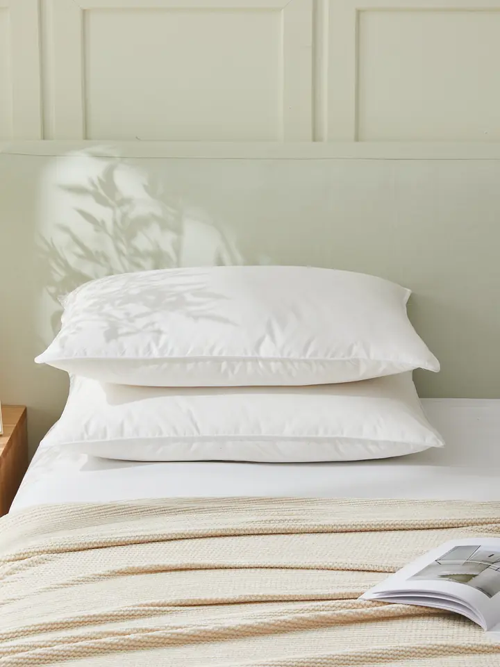 White pillows on a bed