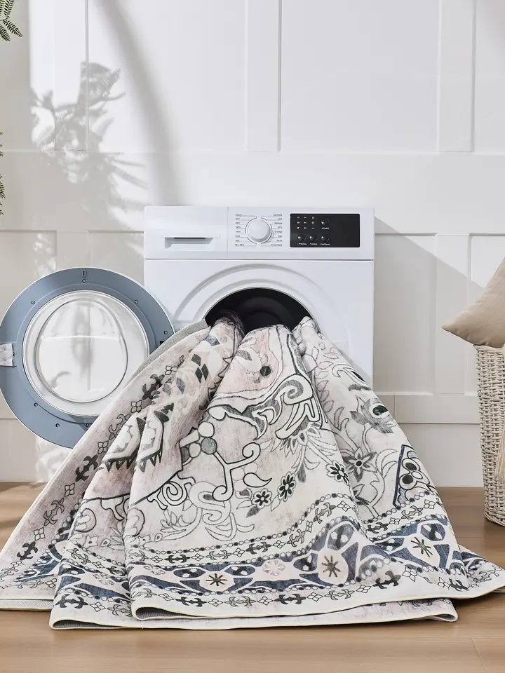 Machine-washable rug next to a washer