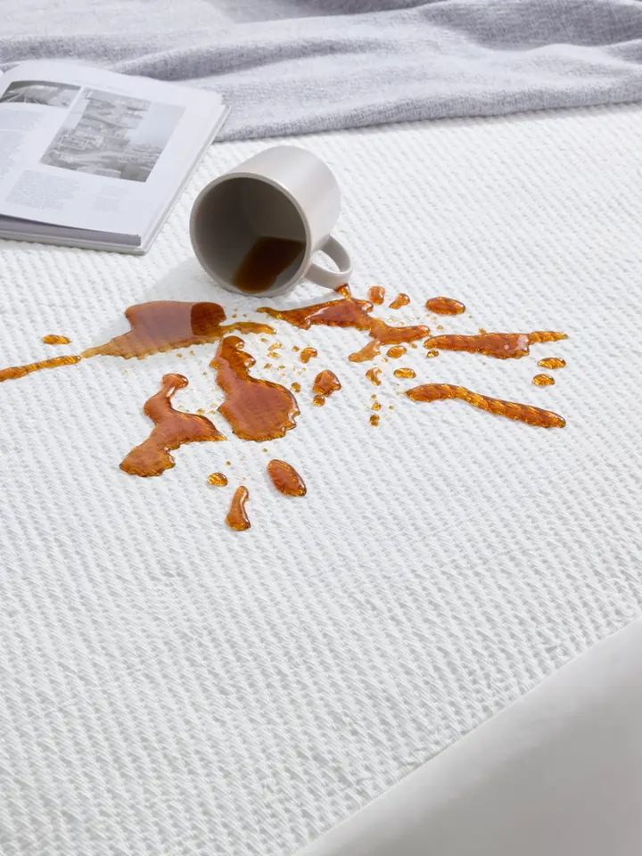 Waterproof mattress protector with coffee spill